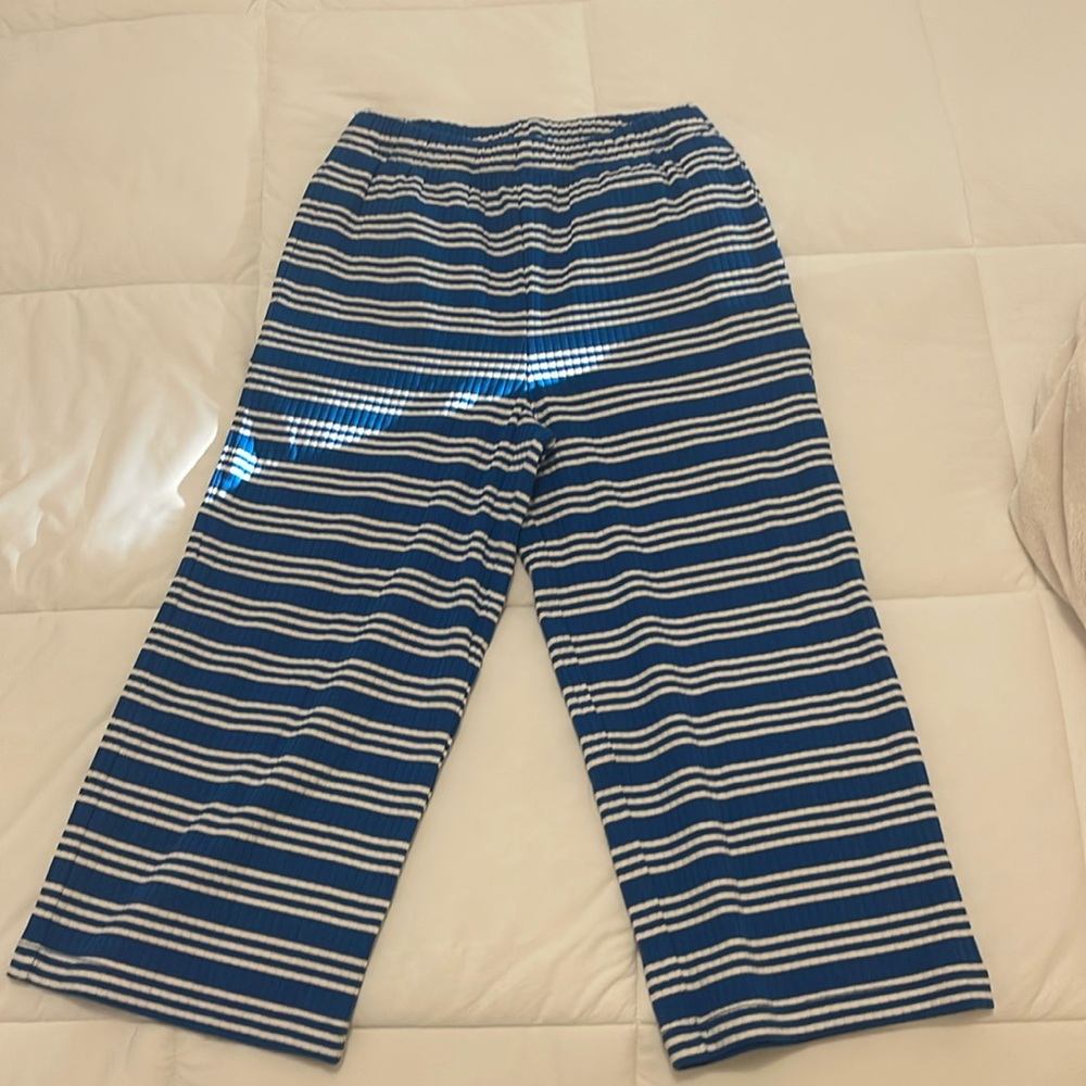 White and Blue striped pants.
